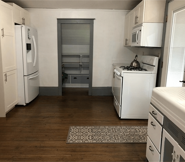 Kitchen with well maintained appliances.