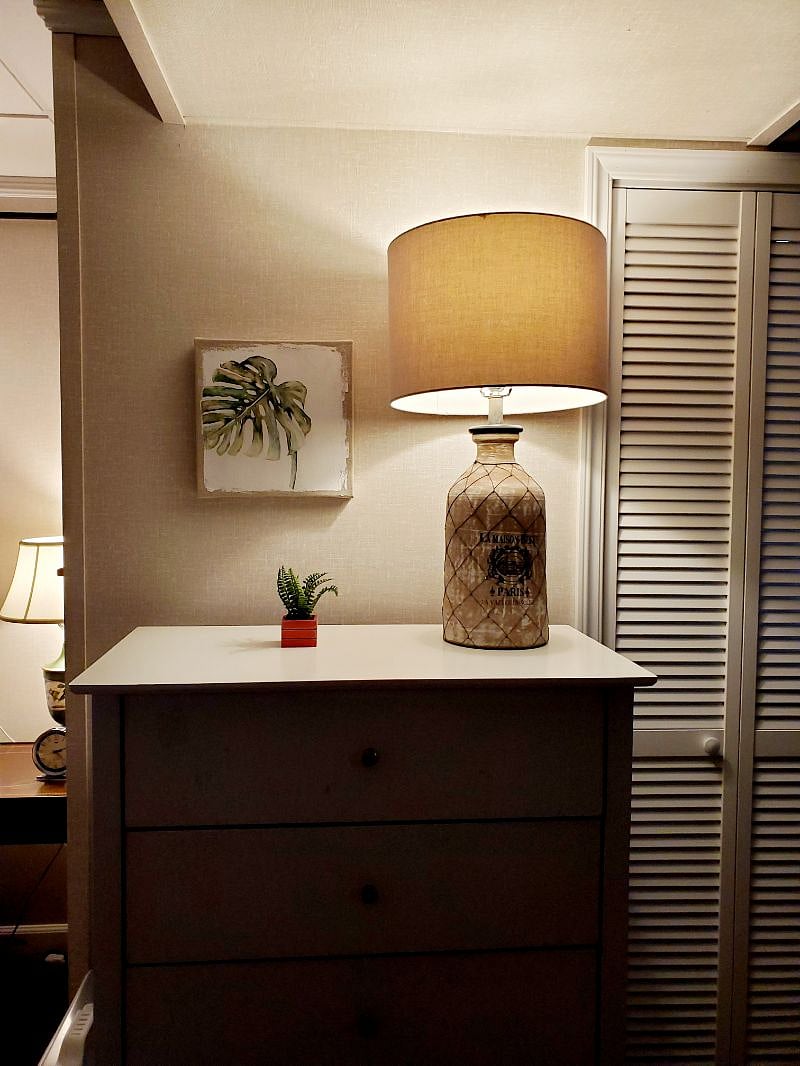 Dresser, closet, coat rack, and luggage rack included in basement apartment.