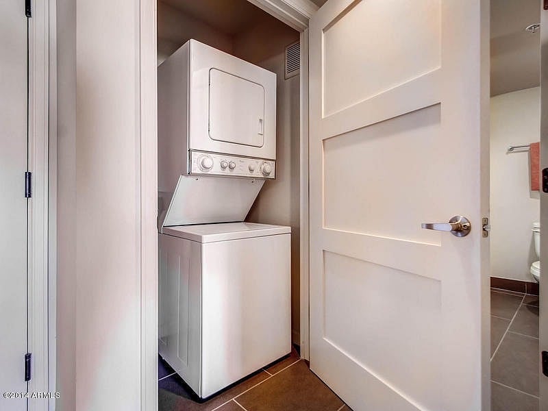 In unit washer and dryer. detergent and drier sheets provided to last a few loads. Small vacuum, a floor steamer provided also.