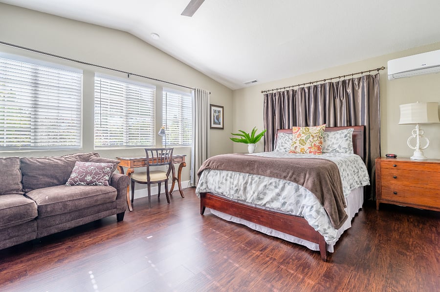 Spacious living and sleeping spaces, independent AC, cross ventilation, blackout drapes, comfy sofa, dedicated workspace, overlooking Zen garden.