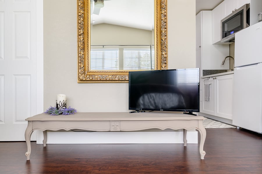 Smart TV, includes WiFi. Enjoy reflections of garden from sitting area, plenty of natural light.