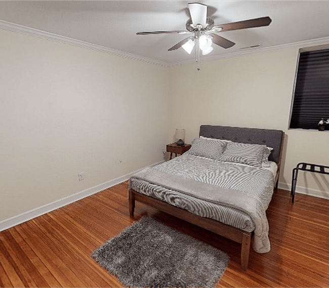 2nd bedroom with queen bed, Roku TV, desk & chair, plenty of closet space.