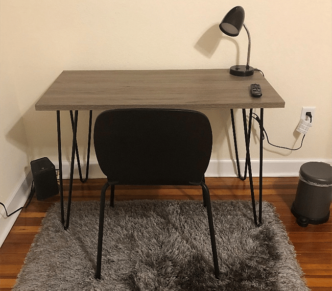 Desk and chair in each bedroom for digital learning or office work from home.