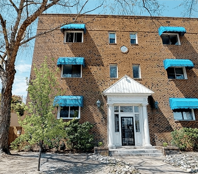 Brick Colonial Exterior. Lower level Condo.