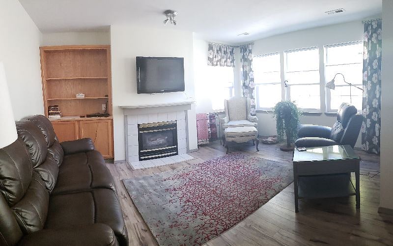 Natural light Cozy gas fireplace