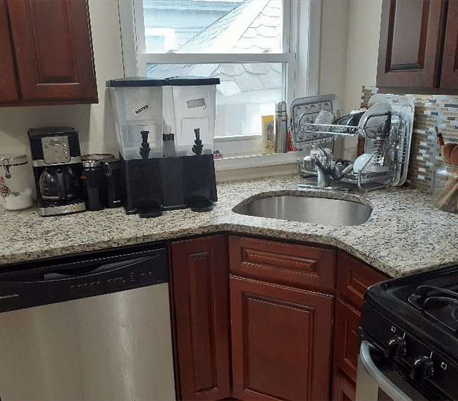 Fully stocked kitchen with updated appliances and essentials