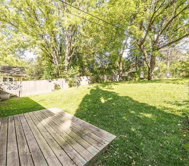 Large fenced-in backyard. 