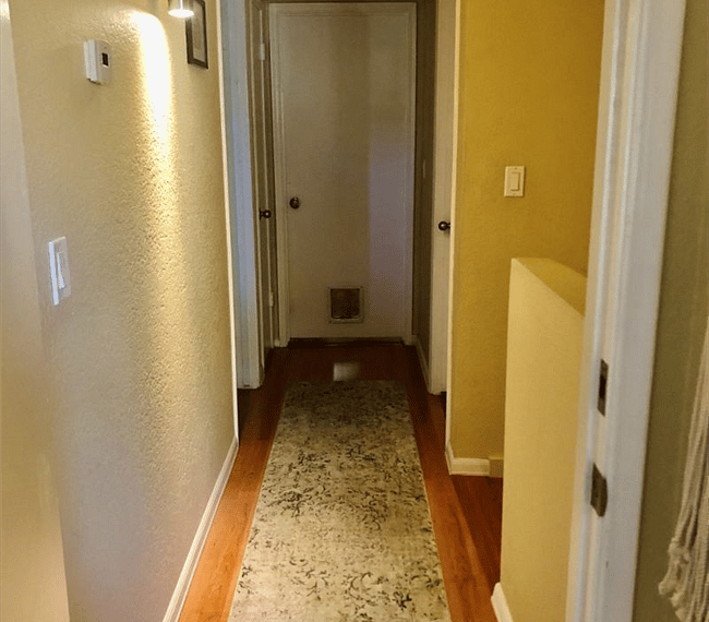 Hallway to the bedrooms and bath