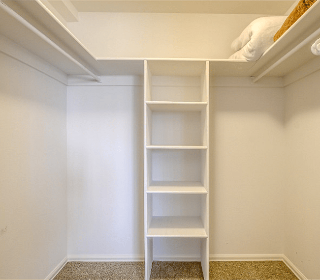 Master Bedroom closet with built in shelving