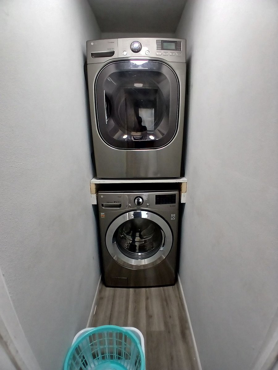 laundry room with washer/dryer located outside the house in the cover patio