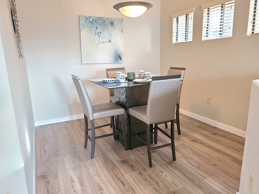 Cozy dining area with counter height dining set.
