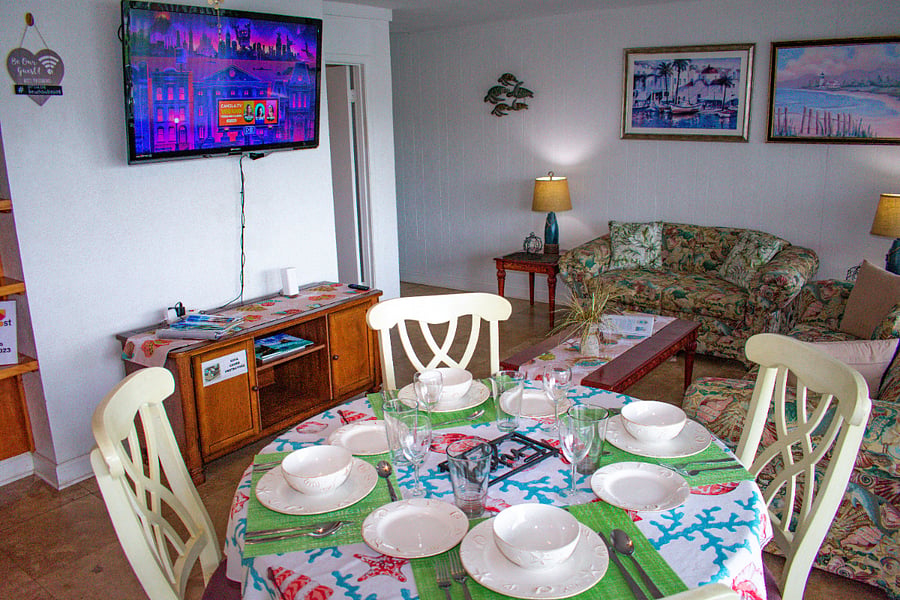 Dining Room Area complete with full silverware and dining sets