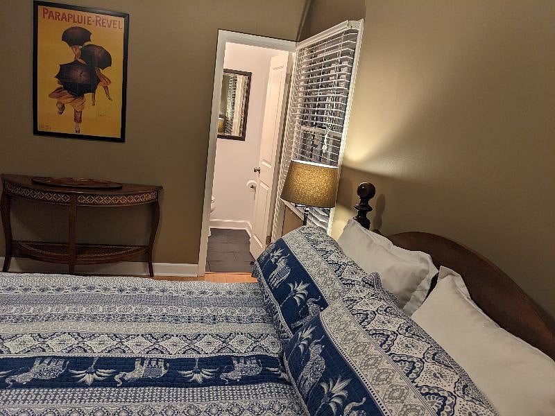 See the half-bath? Natural light from two windows... comfy linens. Full closet and four baskets for personals.