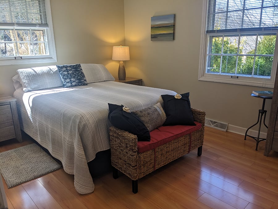Second Bedroom. Queen. Closet with shelves and hanging options - nightstands with drawers.