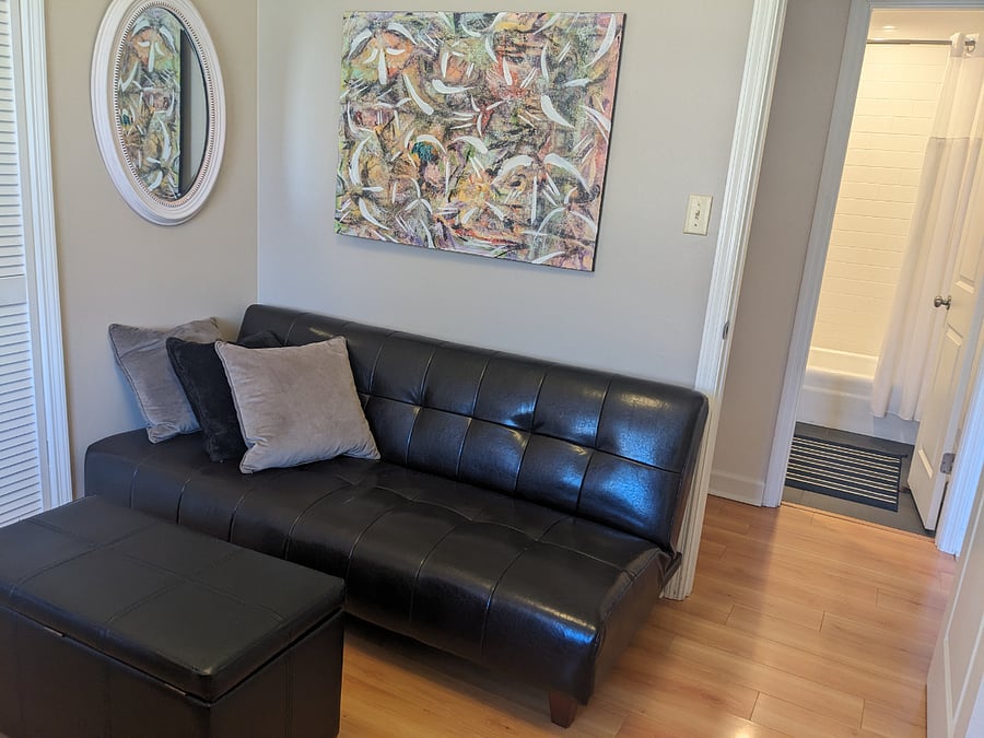 Third bedroom/office space. This sofa flattens into a bed. Thick new mattress pad and linens in the room's closet.