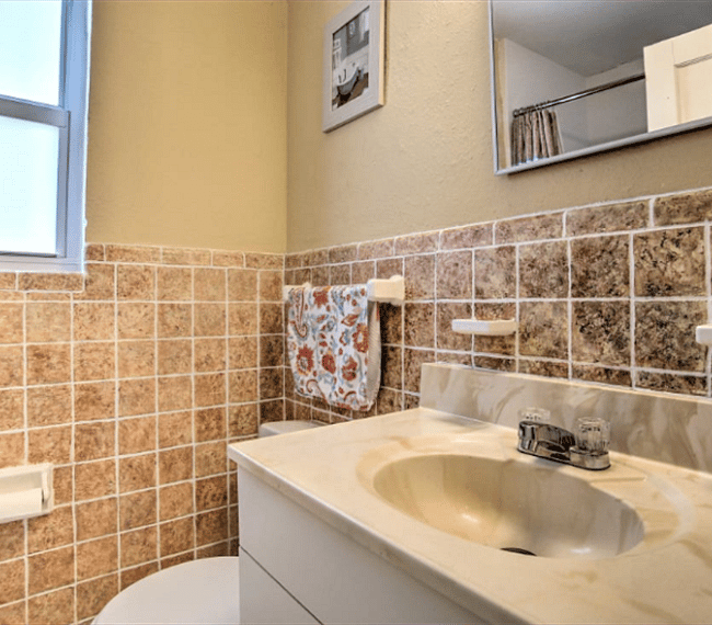 Wash up in the bathroom.