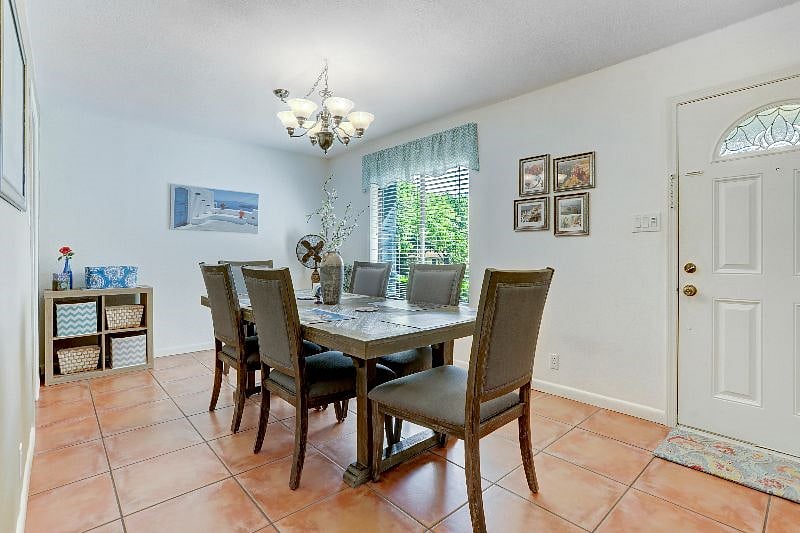 Dining room ready for 8 with table leaf and 2 additional chairs available.