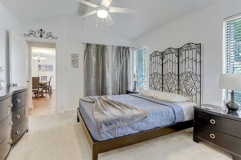 Master bedroom with comfy queen bed and memory foam mattress topper.