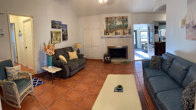The living room connects to the sunroom.
