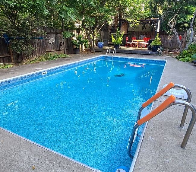 Gated pool area with deck