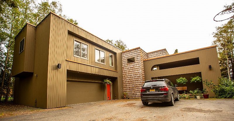 front of our house: suite entrance is orange door by garage door.