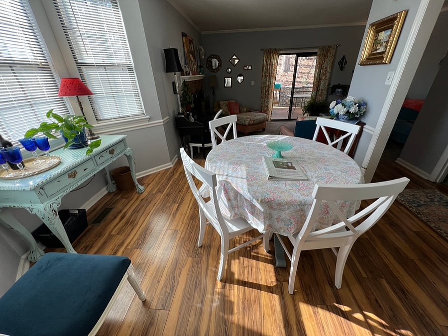 The dining room is off the kitchen and open to the living room.