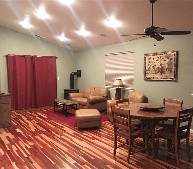 open concept living room area with a 55" flat screen TV