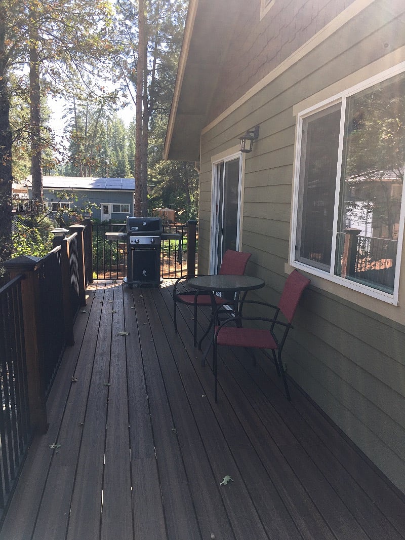 deck with bbq, table and chairs for your enjoyment