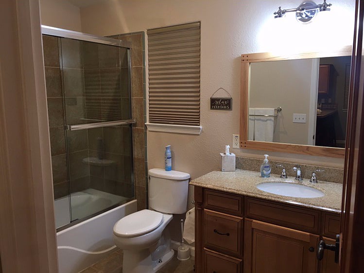 bathroom with bathtub/shower. Equipped with a hand held shower head