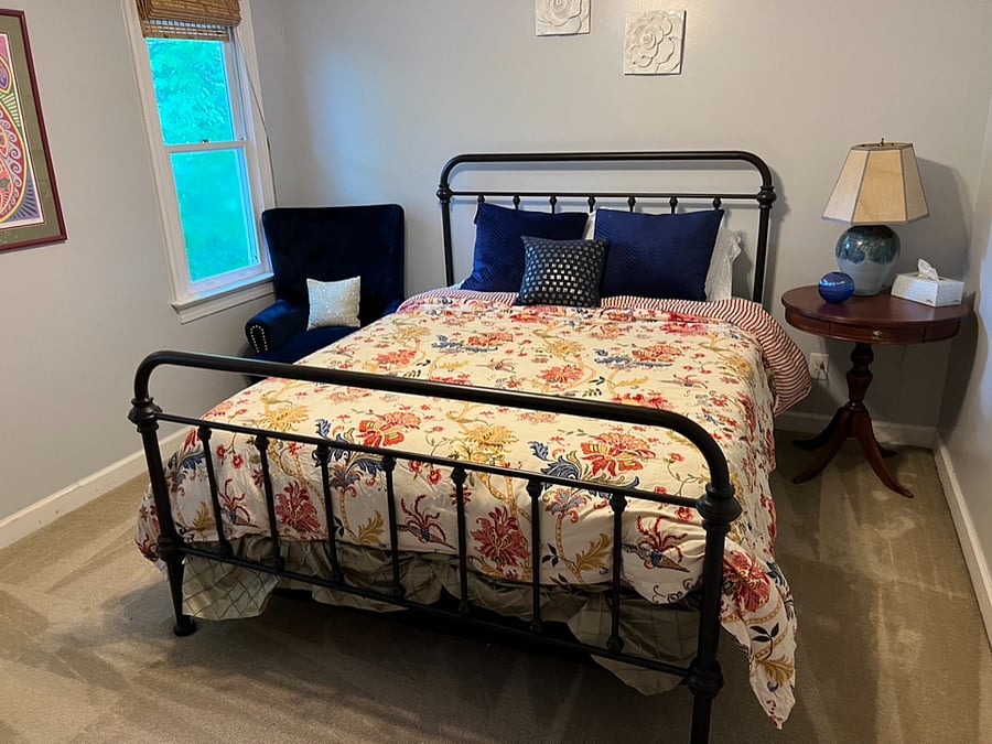 2nd bedroom with queen bed and walk in closet