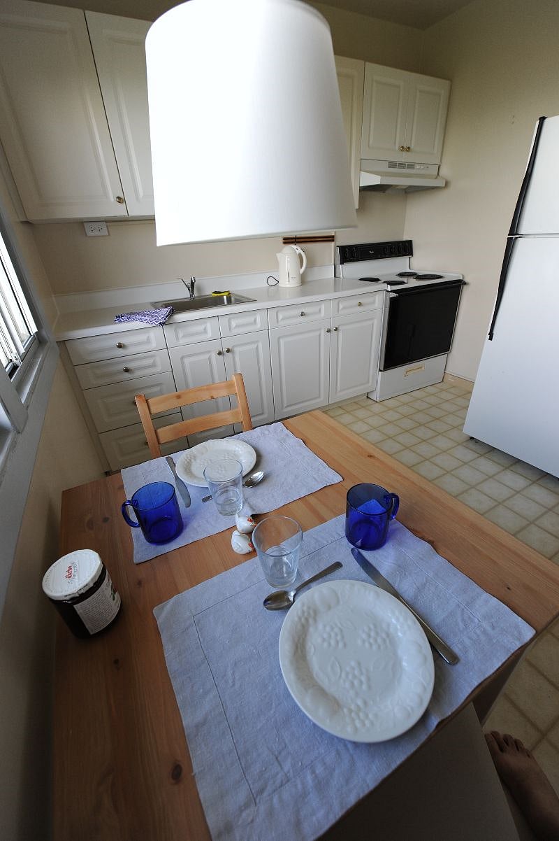 Kitchen. Has full stove and apt sized refrigerator.