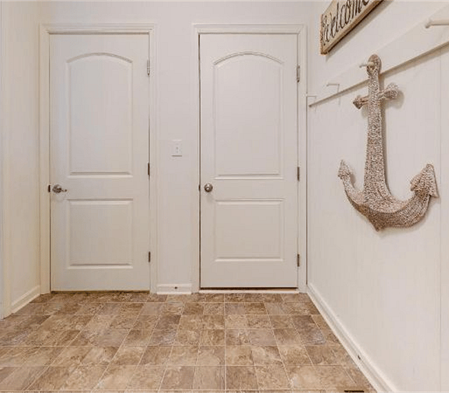 Bed and bathroom entrance