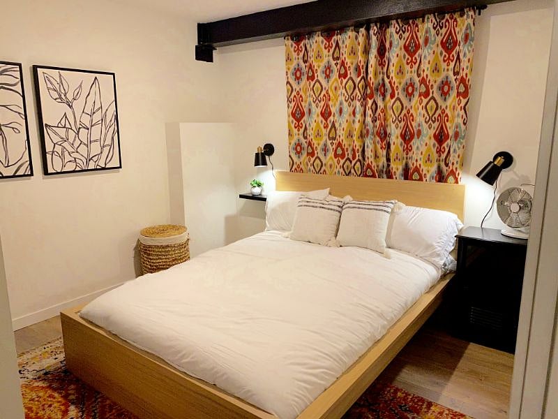 unit 2 bedroom with queen bed and under bed storage