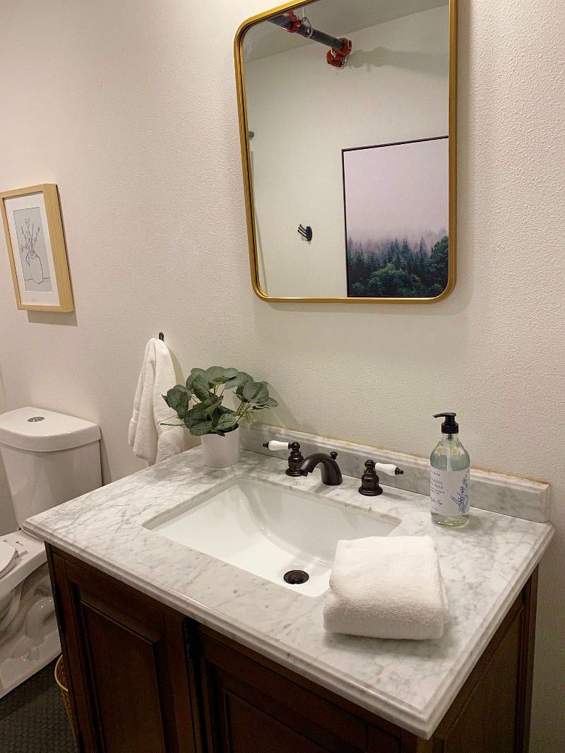 unit 2 bathroom with marble vanity