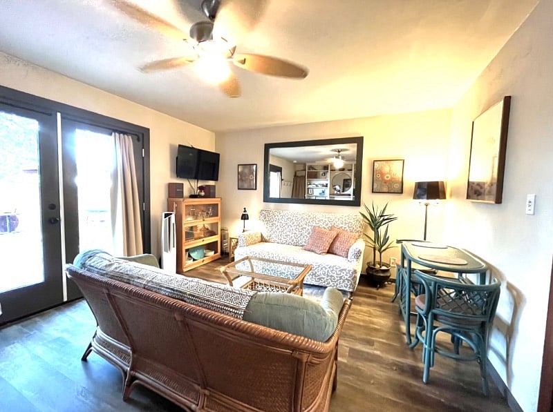 1-BR house. LR has two 6-foot sofas, bar cabinet, dinette, streaming TV with DVD/CD player and external speakers. Blackout drapes. AC/heat, ceiling fan, and a portable heater. LR doors open to a 250 sq ft private deck, which is also furnished. (Deck seating for 6, plus benches in the yard.)