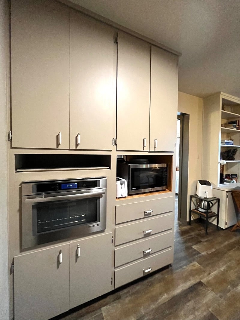 JennAir wall oven has bread proofing, convection, manual bake, and steam. Large microwave, electric kettle, air fryer, coffeemaker, food processor, and KitchenAid stand mixer provided.