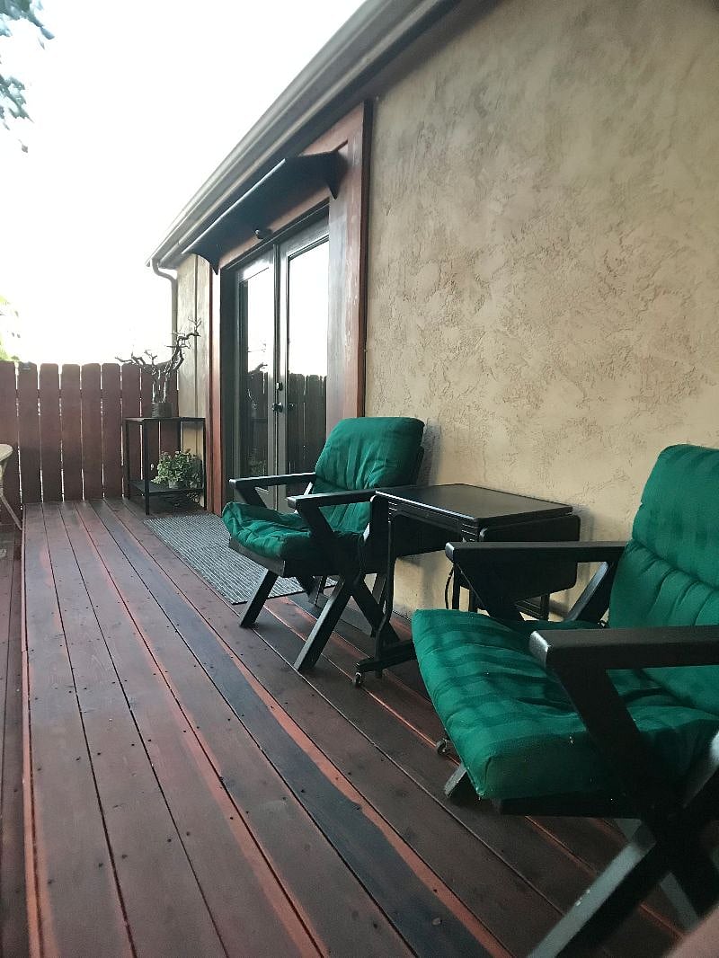 The deck is a lovely place to have coffee or use as an outside office. Grounded outlet behind chair.