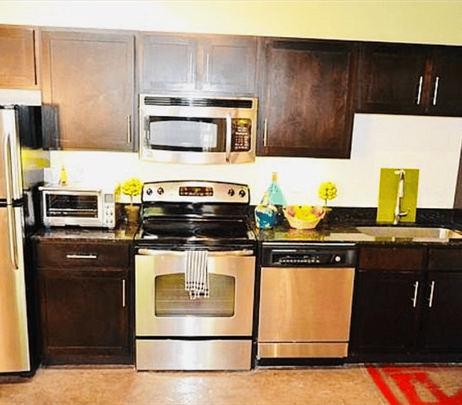 Well-appointed kitchen with oven, dishwasher and storage 