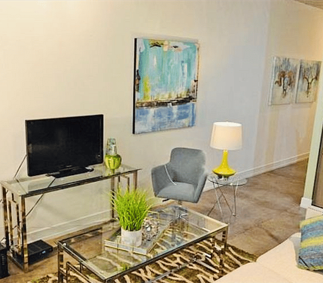 Settle in and watch a movie on the flat screen TV