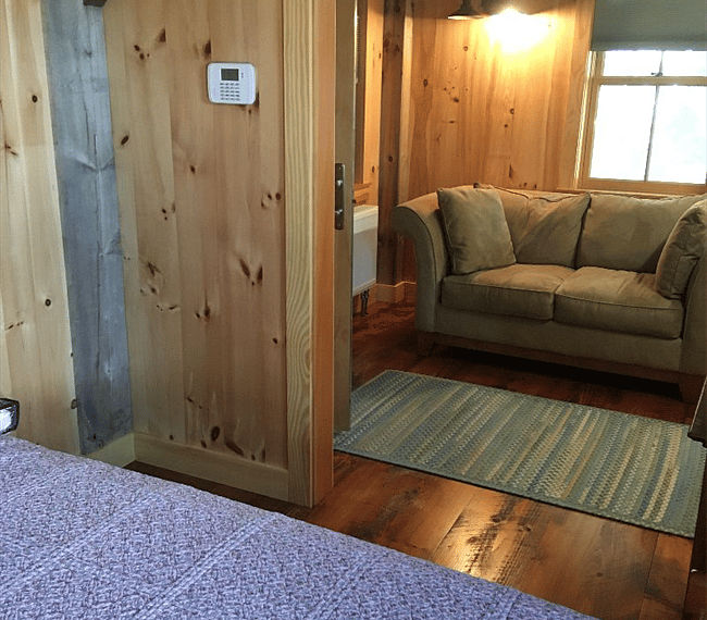 Cozy living space in the master bedroom with a comfortable sofa