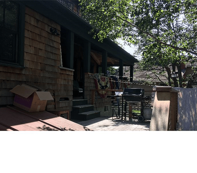 Nice outdoor seating area, with a grill