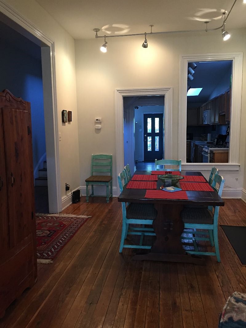 Dining Room with view of kitchen and back door