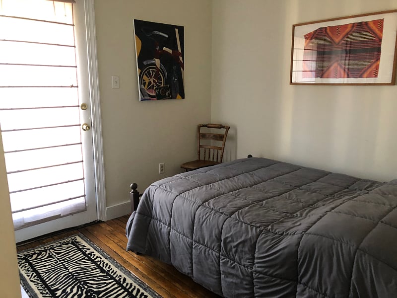 Back bedroom with door to balcony