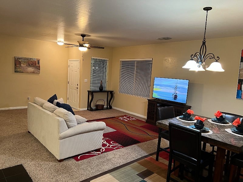 Common living area with smart tv and fireplace.