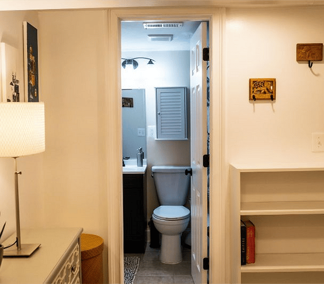 Bathroom with shower tub (behind door)