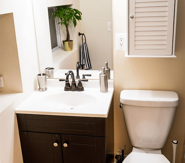 Bathroom with shower tub (behind door)