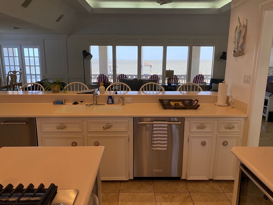 Kitchen with bay views. Visibile in this picture is the sink, ice maker and dishwasher