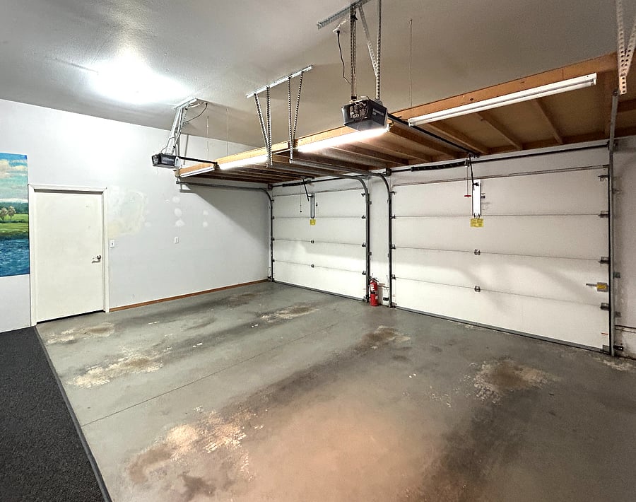 Parking in the 2 - car garage plus   plenty of additional free parking on premises on the driveway. 
