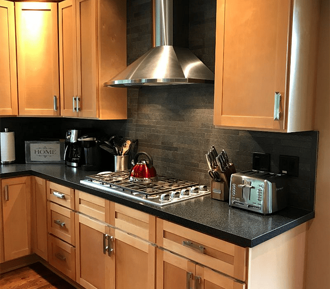A gas stove, drip and Keurig coffee machines and plenty of counter space in this spacious kitchen!