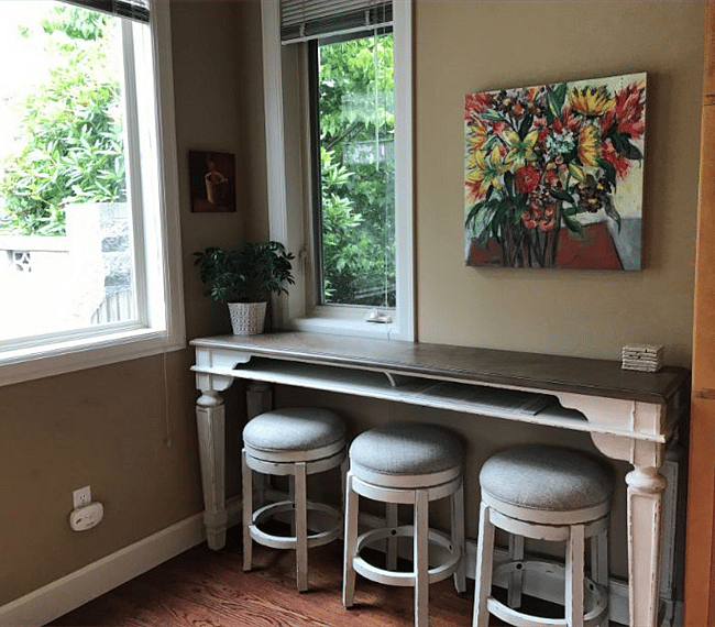 The "Breakfast Bar" in the kitchen - a great place to have coffee, read the latest news and emails... and get caught up on paperwork and homework!